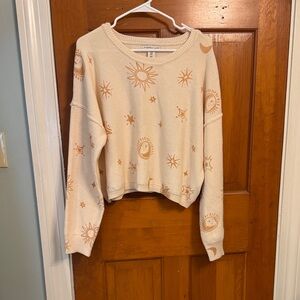 Sincerely Jules Cream Sweater with Sunburst Design